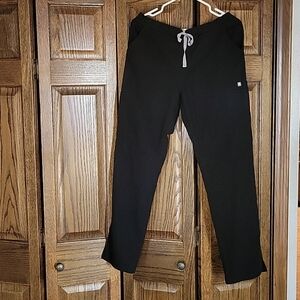 Figs Yola skinny black scrub pants.